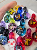 Pop culture themed glass milli pendants